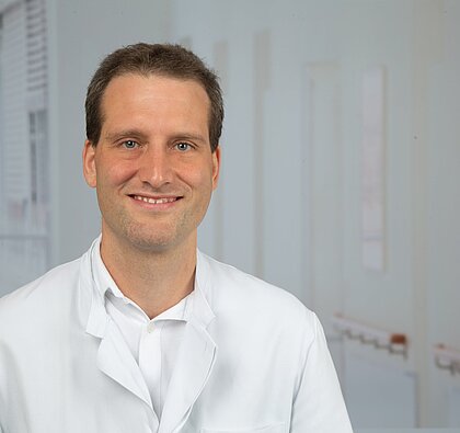 Portraitbild Dr. Macel Féchir Dr. med. Marcel Féchir
